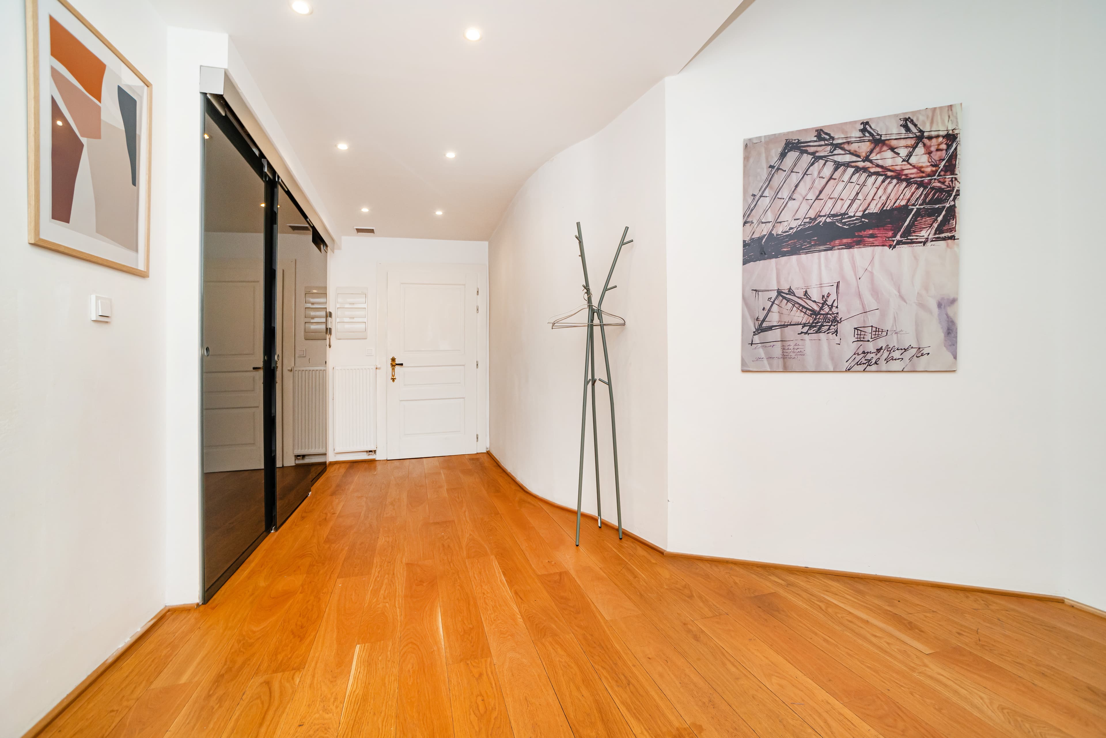 Hallway of a Malá Strana apartment with smart lock by the door